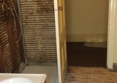 domestic bathroom contaminated with asbestos by the previous builder