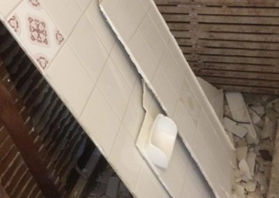 domestic bathroom which was contaminated with asbestos by a builder