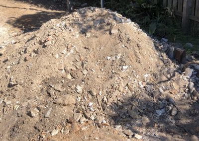 removing contaminated soil from a domestic backyard