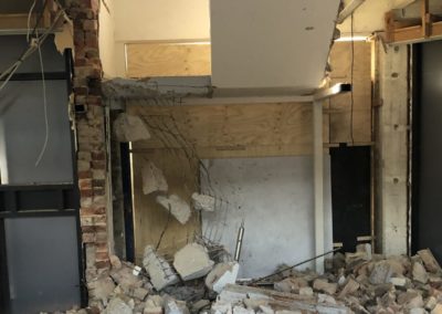 demolishing a stairwell inside a building